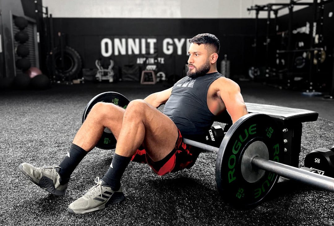 Eric Leija demonstrates the B-stance hip thrust
