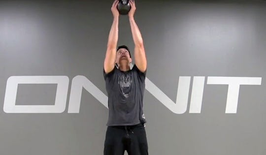Mark de Grasse performs the Kettlebell 2-Hand Clean from Ground to Press