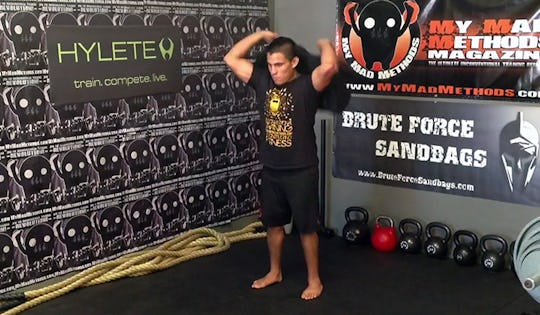 Sandbag Exericse: Diagonal Overhead Swing