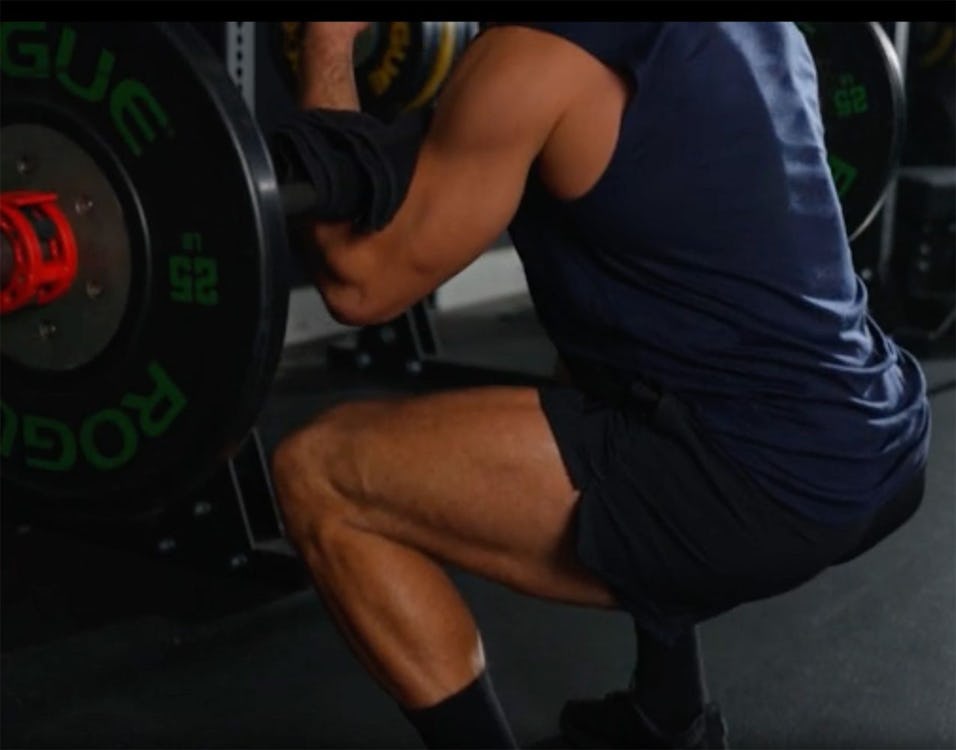 Onnit coach Eric Leija shows the Zercher squat.